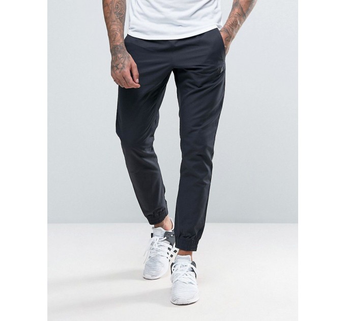 Спортивные брюки Nike NSW Players Jogger Woven 010