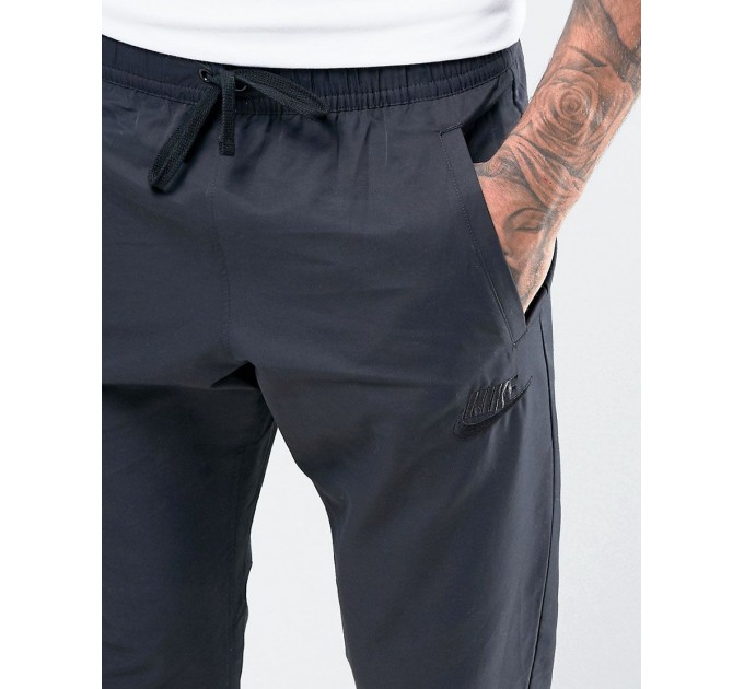 Спортивные брюки Nike NSW Players Jogger Woven 010