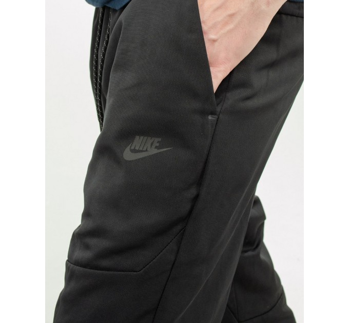 Брюки Nike M Nsw Te+ Wvn Rpl Lnd Pant CU4487-010